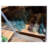 Entire Shelf of Blue Mason Jars of Various Sizes,
