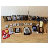 23 Zippo Lighters, 1 Barlow Lighter, 2 Lucienne