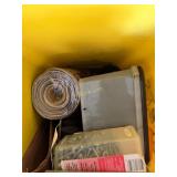 Black and Yellow Storage Tote full of boxes and
