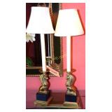 Pair of tall case lamps standing on brass lion