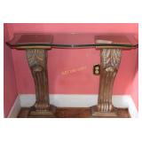 Entrance table with a pair of large carved legs