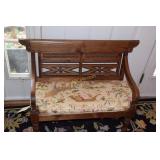 Walnut bench with reflections of empire period.