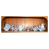 Lot of 10 various porcelain tea pots.