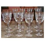 Various stemware with gold rim-13 pieces total.