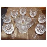 7 cut glass stemware & cut glass pitcher.