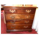 4 drawer walnut chest with beautiful brass pulls.