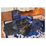 Lot containing 8 bags- rolling suit case, rolling