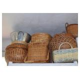 2 shelves of various baskets