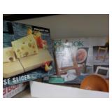 Cheese cutter, cookbook holder