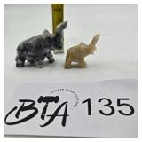 TWO HAND-CARVED STONE ELEPHANTS