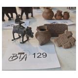 Metal Rocking Animal Figurine and Stone Carvings