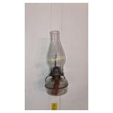 Oil Lamp, Basket, and Small Wooden Bench