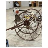 Antique steel wheel fire hose cart