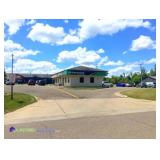 LASTBIDrealestate.com - Commercial Building across from Airport