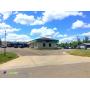 LASTBIDrealestate.com - Commercial Building across from Airport
