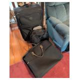 5 Black Travel Bags with Various Features