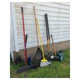 Yard Tool Lot With Rake, Brooms, and Bat