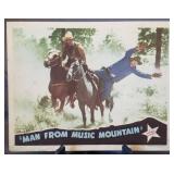 Lobby card, unnumbered, "Man from Music Mountain"