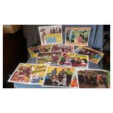 11 colorful reproduction copies of lobby cards