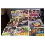 12 colorful reproduction copies of lobby cards