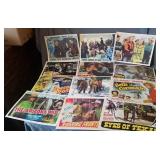 12 colorful reproduction copies of lobby cards