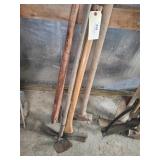 Fence stretcher, sledgehammer, adze & hoe