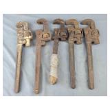 Box of vintage pipe wrenches
