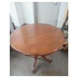 ANTIQUE TABLE ON CASTERS - 36" DIA. X 31" TALL