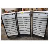 3 computer cabinets on wheels