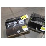 2 boxes, one with digital bus watch