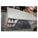 Gray desk with file storage