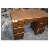 Wooden desk with seven drawers