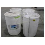 4 empty white barrels