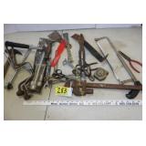 Tin snips, hack saw hammers, speed wrench,