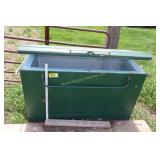 Old freezer used for tack or grain