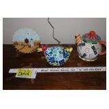 Tea pot, painted saw blade, chicken