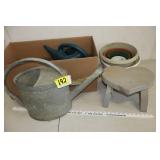 Pots, watering cans, stool