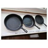 3 cast iron skillets