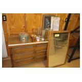 Dresser with mirror and vases