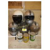 5 Vintage helmets and oil cans