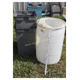 2 trash cans & white barrel