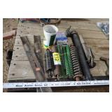 assorted springs, mower blades, seals, u-joint