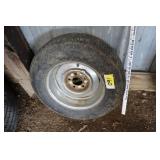P195/75R14 tire on chrome rim
