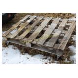 pallet on castor wheels