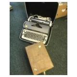 Electric Typewriter and a Pitney Bowes box with misc contents Electric Typewriter and a Pitney Bowes box with misc contents