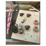 Buttons, and assorted keychains Buttons, and assorted keychains
