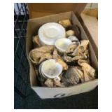 Box with assorted milk glass, still wrapped in old paper Box with assorted milk glass, still wrapped in old paper