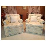 2 vintage sofas with a floral pattern theme, and