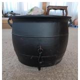Three Leg Cast Iron Cauldron. Has some holes in