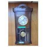 Wall mounted Windup clock with key